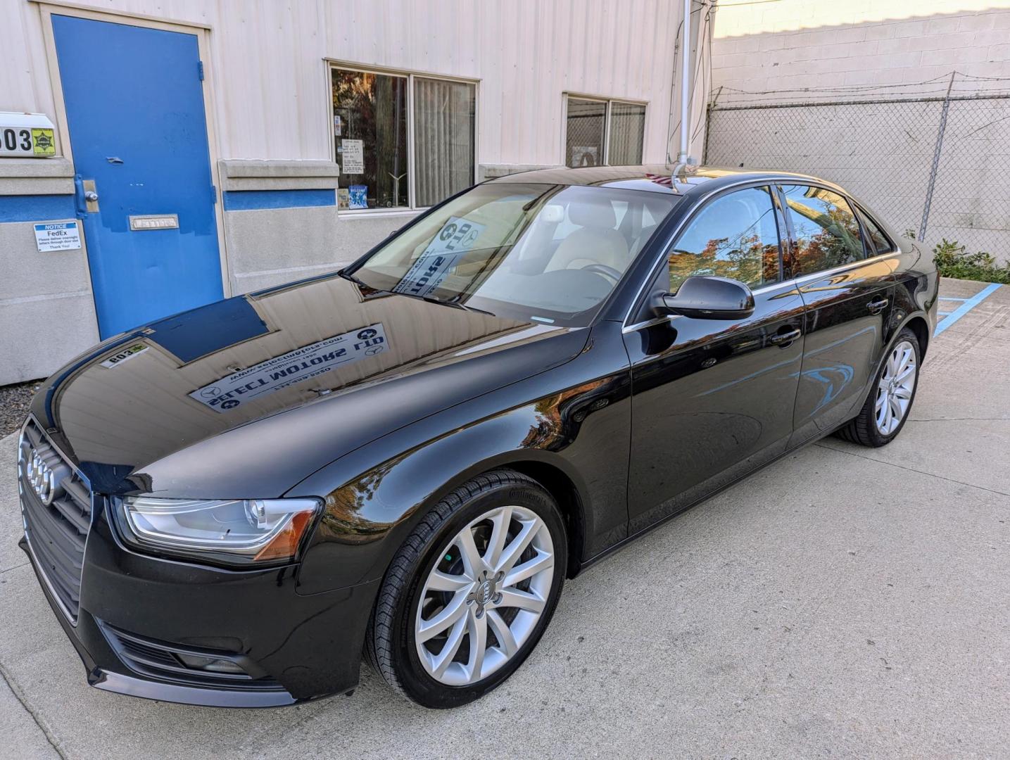 2013 Black /Beige/Black Leather Audi A4 2.0T Sedan quattro Tiptronic (WAUFFAFL9DN) with an 2.0L L4 DOHC 16V TURBO engine, 6-Speed Automatic transmission, located at 603 Amelia Street, Plymouth, MI, 48170, (734) 459-5520, 42.378841, -83.464546 - Vehicles shown by appointment - Please call ahead - 734-459-5520, text 734-658-4573 or contact us via our web site at: http://www.selectmotors.com for complete Inventory, Photos, Videos and FREE Carfax Reports. 2013 Audi A4 Quattro 2.0T Premium Plus, Brilliant Black with Beige/Black leather i - Photo#0