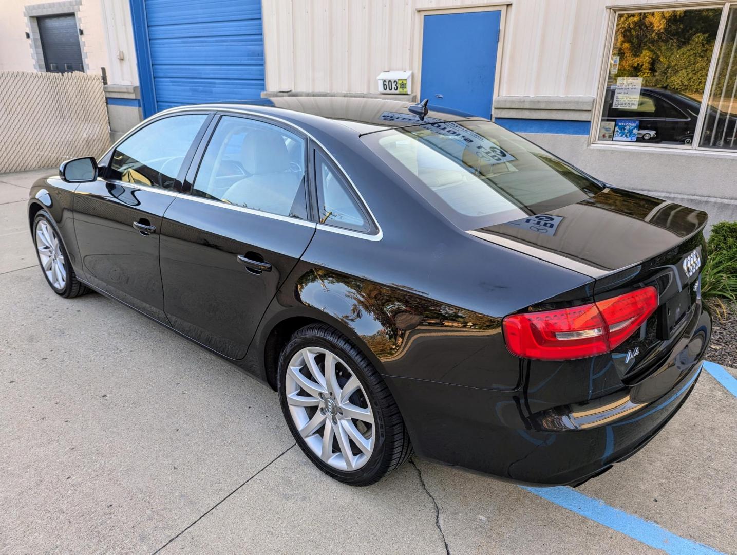 2013 Black /Beige/Black Leather Audi A4 2.0T Sedan quattro Tiptronic (WAUFFAFL9DN) with an 2.0L L4 DOHC 16V TURBO engine, 6-Speed Automatic transmission, located at 603 Amelia Street, Plymouth, MI, 48170, (734) 459-5520, 42.378841, -83.464546 - Vehicles shown by appointment - Please call ahead - 734-459-5520, text 734-658-4573 or contact us via our web site at: http://www.selectmotors.com for complete Inventory, Photos, Videos and FREE Carfax Reports. 2013 Audi A4 Quattro 2.0T Premium Plus, Brilliant Black with Beige/Black leather i - Photo#2