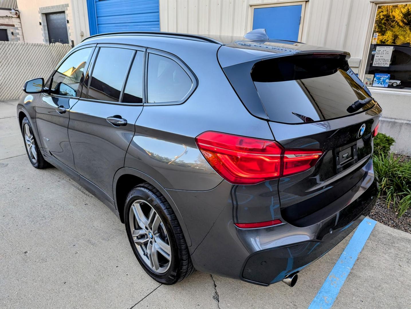 2016 Mineral Grey Metallic /Black Leather BMW X1 xDrive28i (WBXHT3C3XGP) with an 2.0L L4 DOHC 16V engine, 8A transmission, located at 603 Amelia Street, Plymouth, MI, 48170, (734) 459-5520, 42.378841, -83.464546 - Vehicles shown by appointment - Please call ahead - 734-459-5520, text 734-658-4573 or contact us via our web site at: http://www.selectmotors.com for complete Inventory, Photos, Videos and FREE Carfax Reports. 2016 BMW X1 xDrive 2.8i, Mineral Grey Metallic with Black leather interior, 91K miles, - Photo#3