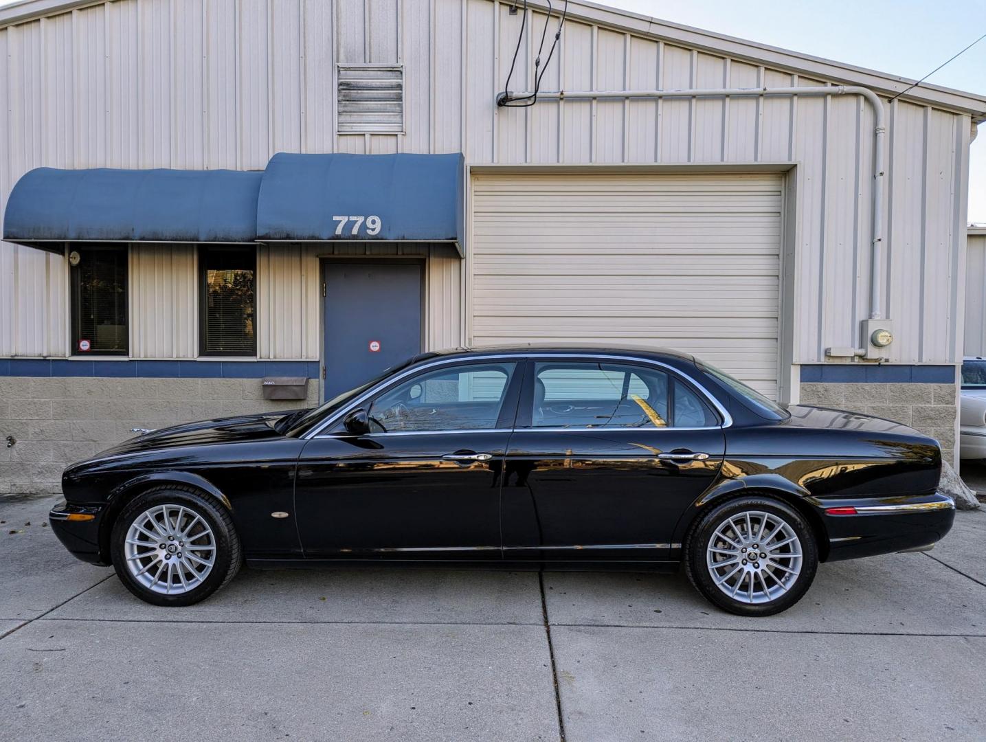 2006 Black /Black Leather Jaguar XJ-Series XJ8 L (SAJWA79B86S) with an 4.2L V8 DOHC 32V engine, 6-Speed Automatic Overdrive transmission, located at 603 Amelia Street, Plymouth, MI, 48170, (734) 459-5520, 42.378841, -83.464546 - Vehicles shown by appointment - Please call ahead - 734-459-5520, text 734-658-4573 or contact us via our web site at: http://www.selectmotors.com for complete Inventory, Photos, Videos and FREE Carfax Reports. 2006 Jaguar XJ8-L, Black with black leather interior, 126K miles, same owner since 200 - Photo#3