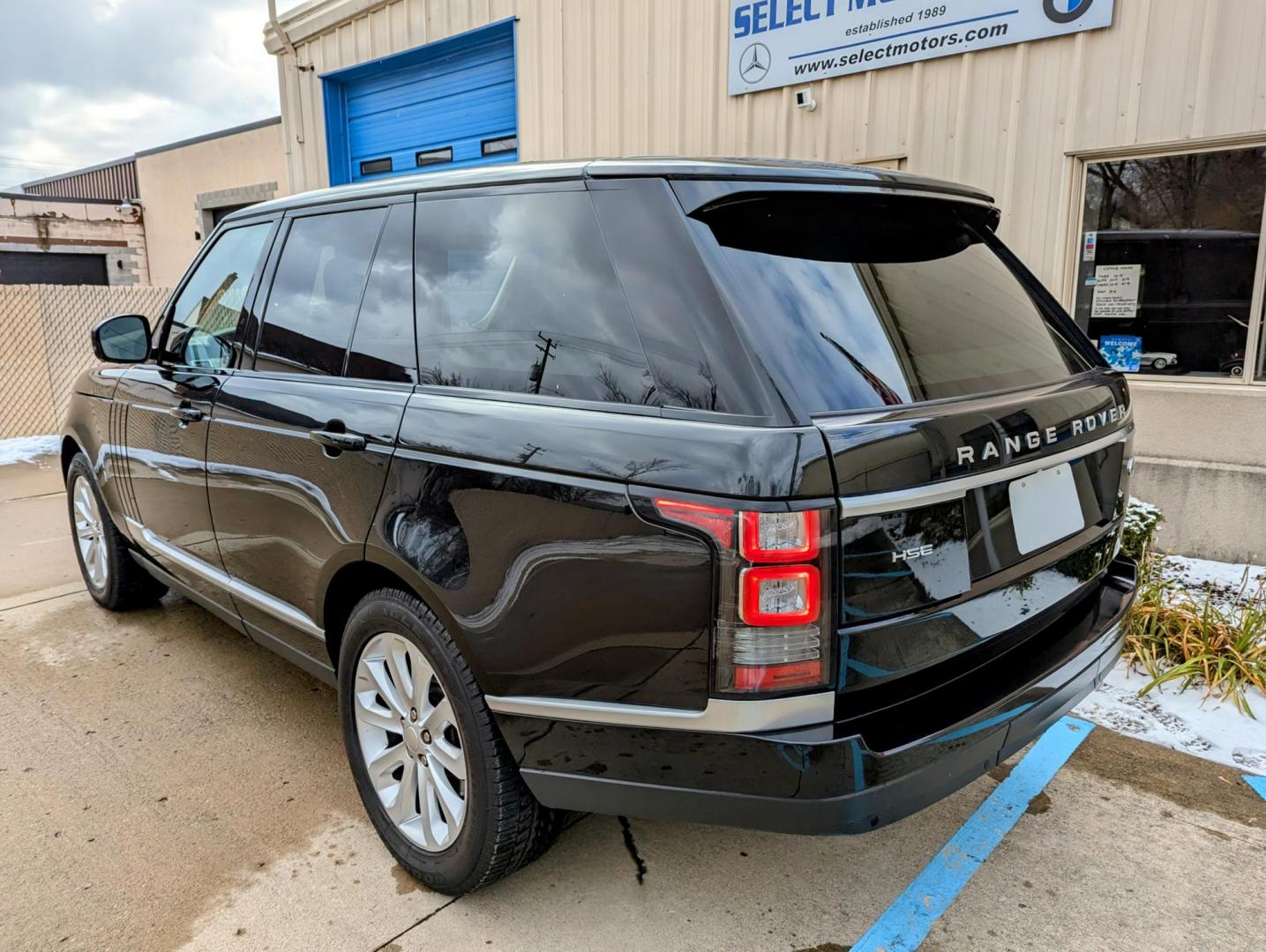 2014 Black /Black Land Rover Range Rover 3.0L V6 Supercharged HSE (SALGS2WF7EA) with an 3.0L V6 DOHC 24V SUPERCHARGED FFV engine, 8-Speed Automatic transmission, located at 603 Amelia Street, Plymouth, MI, 48170, (734) 459-5520, 42.378841, -83.464546 - Vehicles shown by appointment - Please call ahead - 734-459-5520, text 734-658-4573 or contact us via our web site at: http://www.selectmotors.com for complete Inventory, Photos, Videos and FREE Carfax Reports. 2014 Land Rover Range Rover HSE, Santorini Black with black & ivory interior, V6 Super - Photo#2