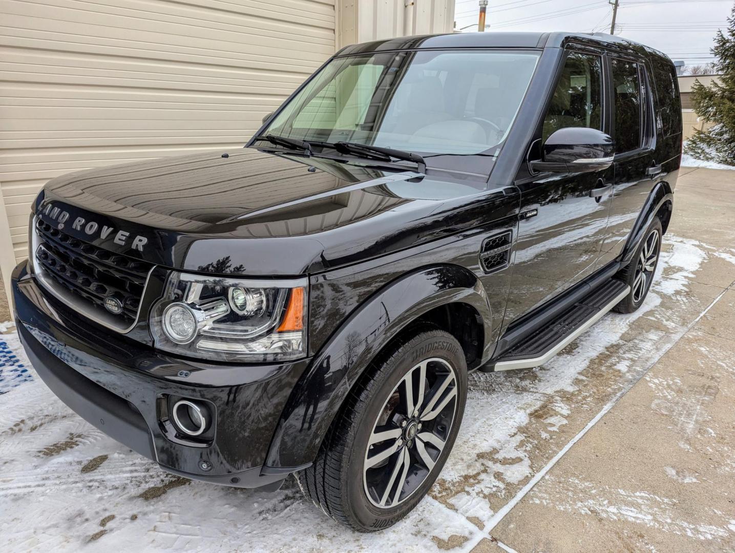 2016 Black /Almond Leather Land Rover LR4 HSE (SALAG2V66GA) with an 3.0L V6 DOHV 24V engine, 6-Speed Automatic transmission, located at 603 Amelia Street, Plymouth, MI, 48170, (734) 459-5520, 42.378841, -83.464546 - Vehicles shown by appointment - Please call ahead - 734-459-5520, text 734-658-4573 or contact us via our web site at: http://www.selectmotors.com for complete Inventory, Photos, Videos and FREE Carfax Reports. 2016 Land River LR4 HSE, Santorini Black Metallic with Almond Leather interior, - Photo#0